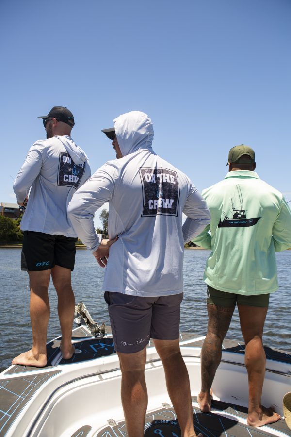 281A8444 scaled Fishing and lifestyle clothing. On The Chew <ul class="mybullet"> <li>Light weight hooded jersey with a built in franga</li> <li>Custom polyester blend for total comfort</li> <li>Soft & smooth 4-way stretch</li> <li>Ventilated for ultimate breathability</li> <li>Moisture wicking & fast drying</li> <li>UPF 30+ sun protection with collar</li> <li>Please note that due to variations amongst screens and photo lighting, actual colours may vary</li> </ul> <p style="text-align: center;">[button size="medium" style="secondary" text="Click to get in the box in a TEE" link="https://onthechew.com.au/product/in-the-box-tee/"]</p> $79.99
