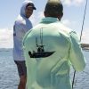 original 5 Fishing and lifestyle clothing. On The Chew <ul class="mybullet"> <li>Light weight hooded jersey with a built in franga</li> <li>Custom polyester blend for total comfort</li> <li>Soft & smooth 4-way stretch</li> <li>Ventilated for ultimate breathability</li> <li>Moisture wicking & fast drying</li> <li>UPF 30+ sun protection with collar</li> <li>Please note that due to variations amongst screens and photo lighting, actual colours may vary</li> </ul> <p style="text-align: center;">[button size="medium" style="secondary" text="Click to get in the box in a TEE" link="https://onthechew.com.au/product/in-the-box-tee/"]</p> $79.99