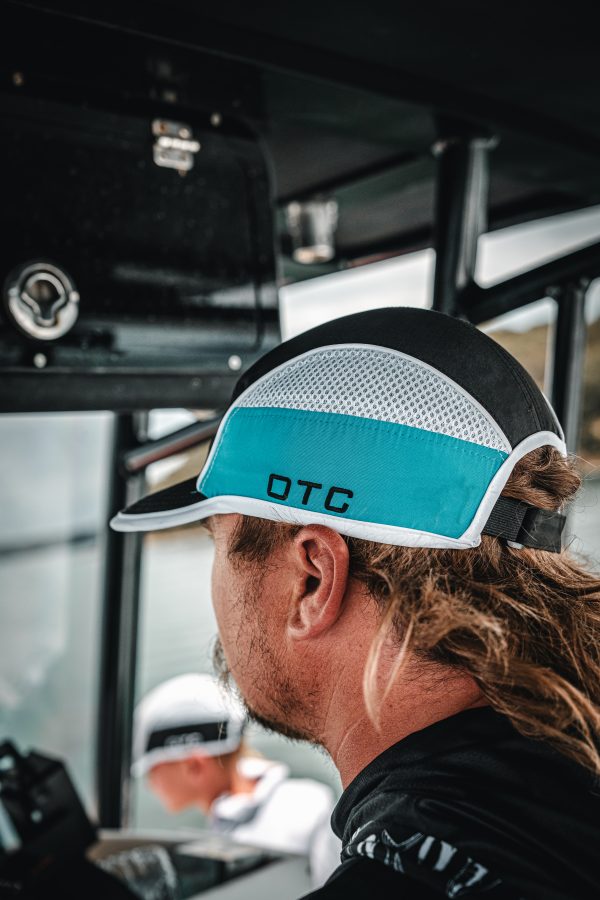OTC HAT AND T 14 scaled Fishing and lifestyle clothing. On The Chew REMOVABLE BACK FLAP ADJUSTABLE VELCRO STRAP ONE SIZE FITS MOST ELASTIC ON ADJUSTMENT FOR COMFORT WATERPROOF FAST DRYING 100% POLYESTER $39.99